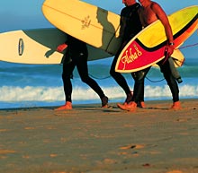 Surfer am Praia do Guincho