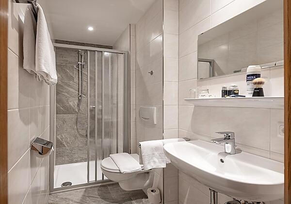 Kur- Sporthotel Alpenhof Badezimmer