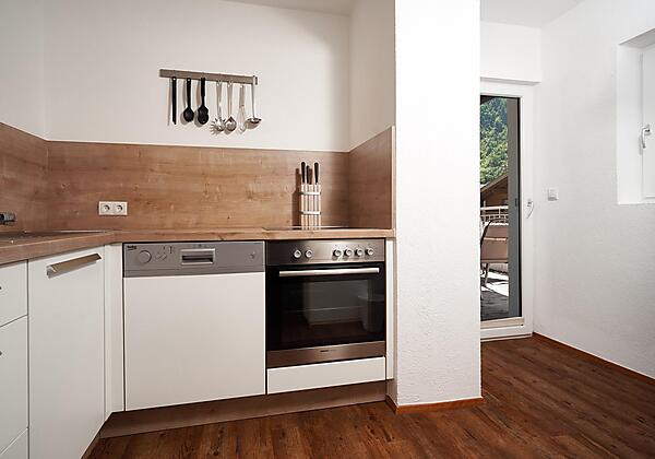 Küche mit Zugang zur Terrasse/Balkon