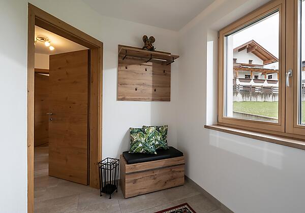 Apart_Fruehmann_Oberwilstrasse_10_Aschau_Eingangsb