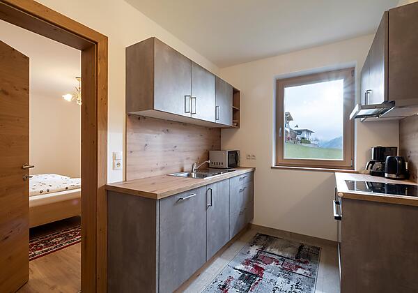 Apart_Fruehmann_Oberwilstrasse_10_Aschau_Wohnraum_