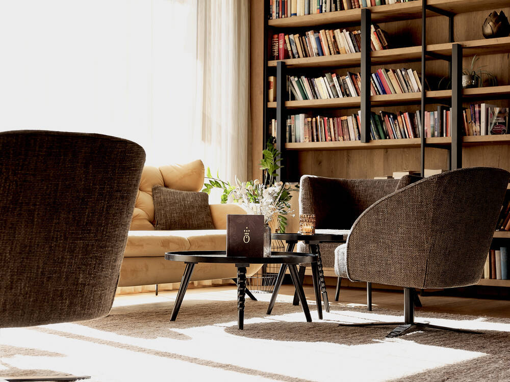 Lounge im Familien und Aktivhotel die HOCHKÖNIGIN mit gemütlichen Sitzgruppen zum Buch lesen, Musik 