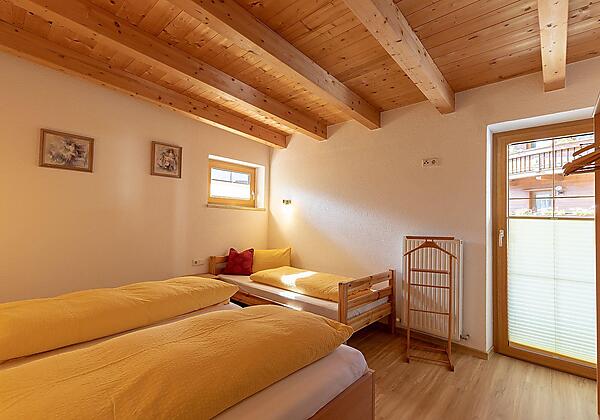 Schlafzimmer mit Zusatzbett