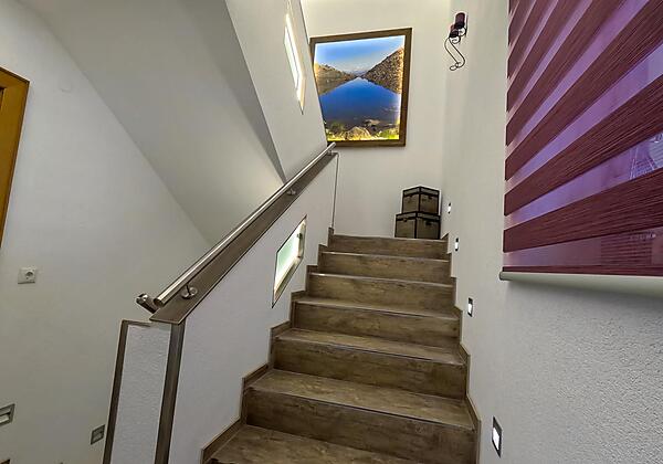 Stiegenaufgang zur Ferienwohnung im 1. Stock